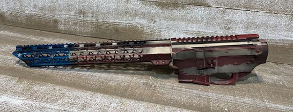 Battle flag themed Cerakote design on pistol slide