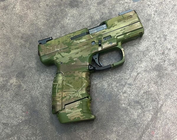 Custom multi-color Cerakote finished pistol